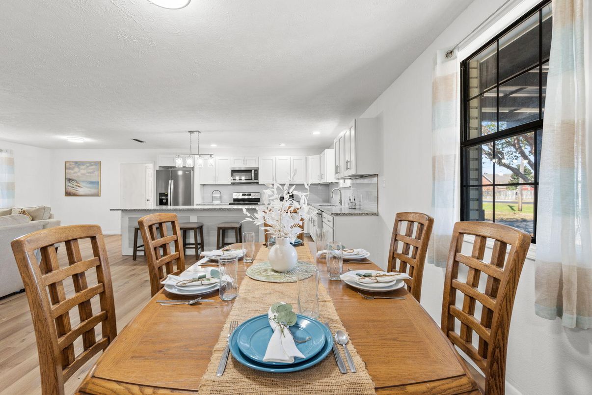 Dining room, Interior, Kitchen, Pendant Lights, Recessed Lighting, Stainless Steel Appliances, Wood Texture Flooring