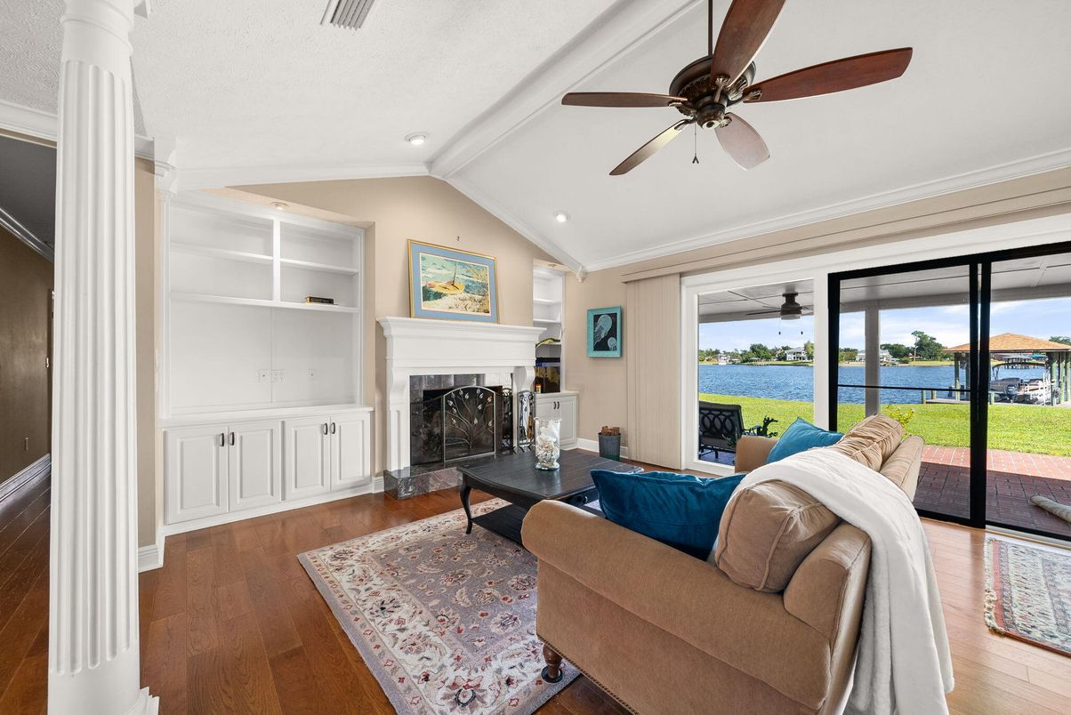 Fireplace, Interior, Living room, Recessed Lighting, Water, Wood Texture Flooring