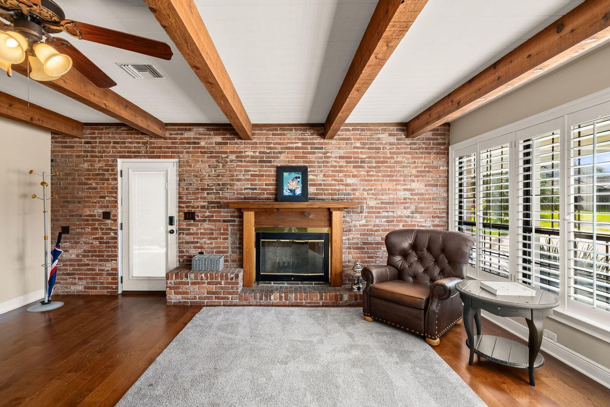 Empty room, Fireplace, Interior, Stone Walls, Wooden Beams, Wood Texture Flooring