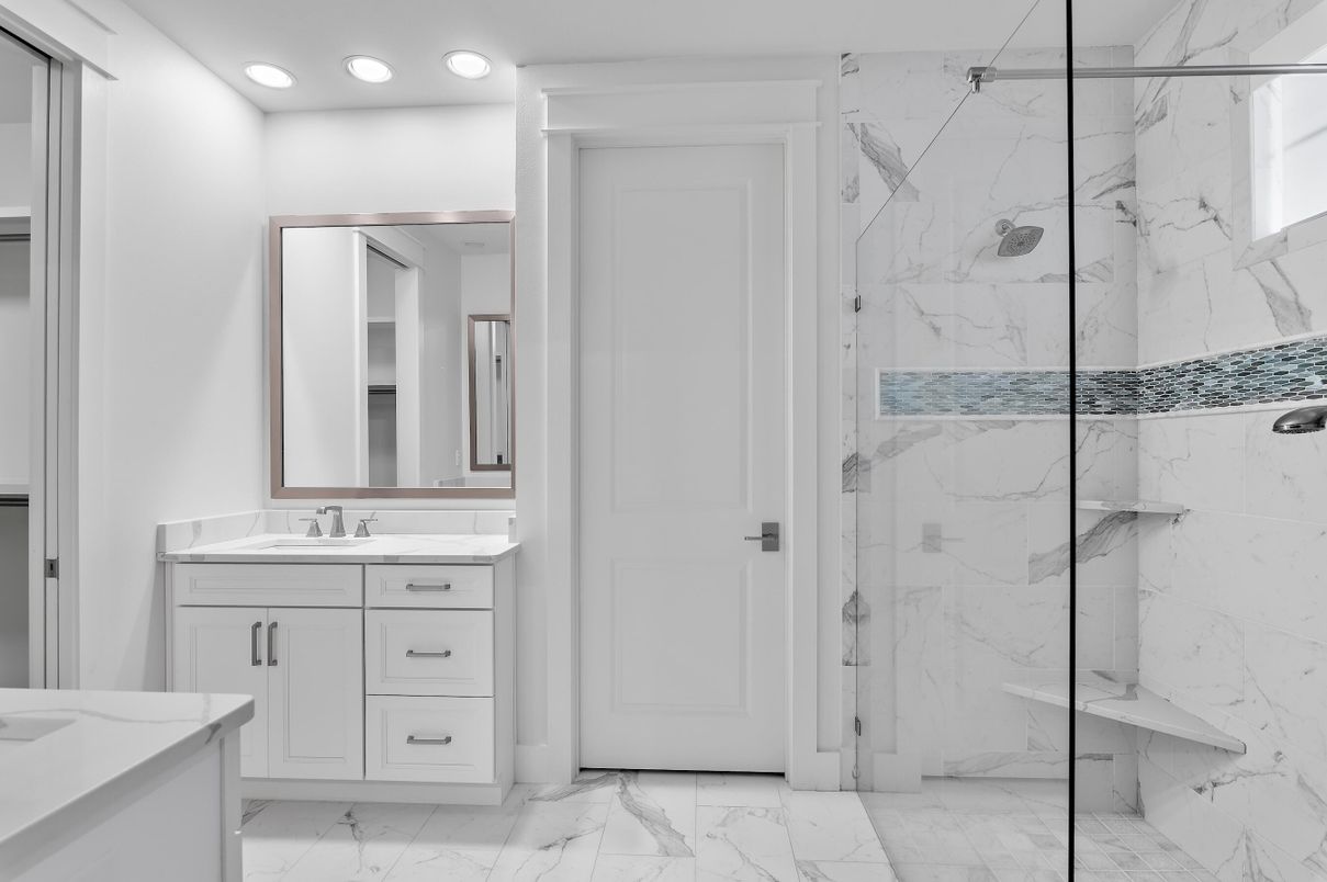 Bathroom, Dual Sink Vanities, Glass Shower, Interior, Marble, Marble Walls, Recessed Lighting
