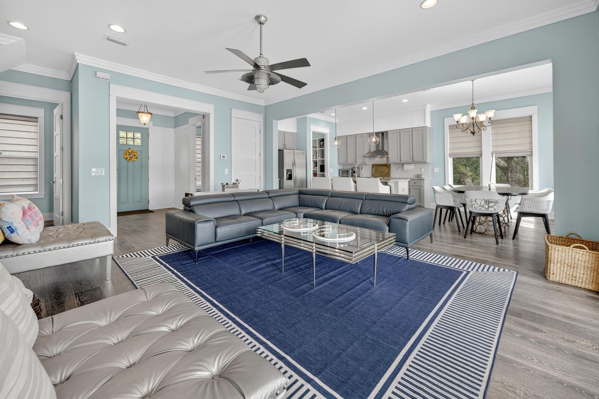 Chandelier, Dining room, Interior, Kitchen, Living room, Pendant Lights, Recessed Lighting, Stainless Steel Appliances, Wood Texture Flooring