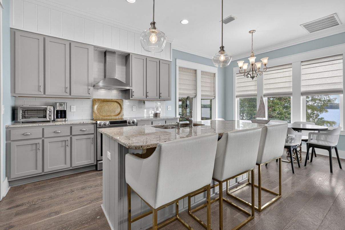 Chandelier, Dining room, Interior, Kitchen, Pendant Lights, Recessed Lighting, Stainless Steel Appliances, Wood Texture Flooring