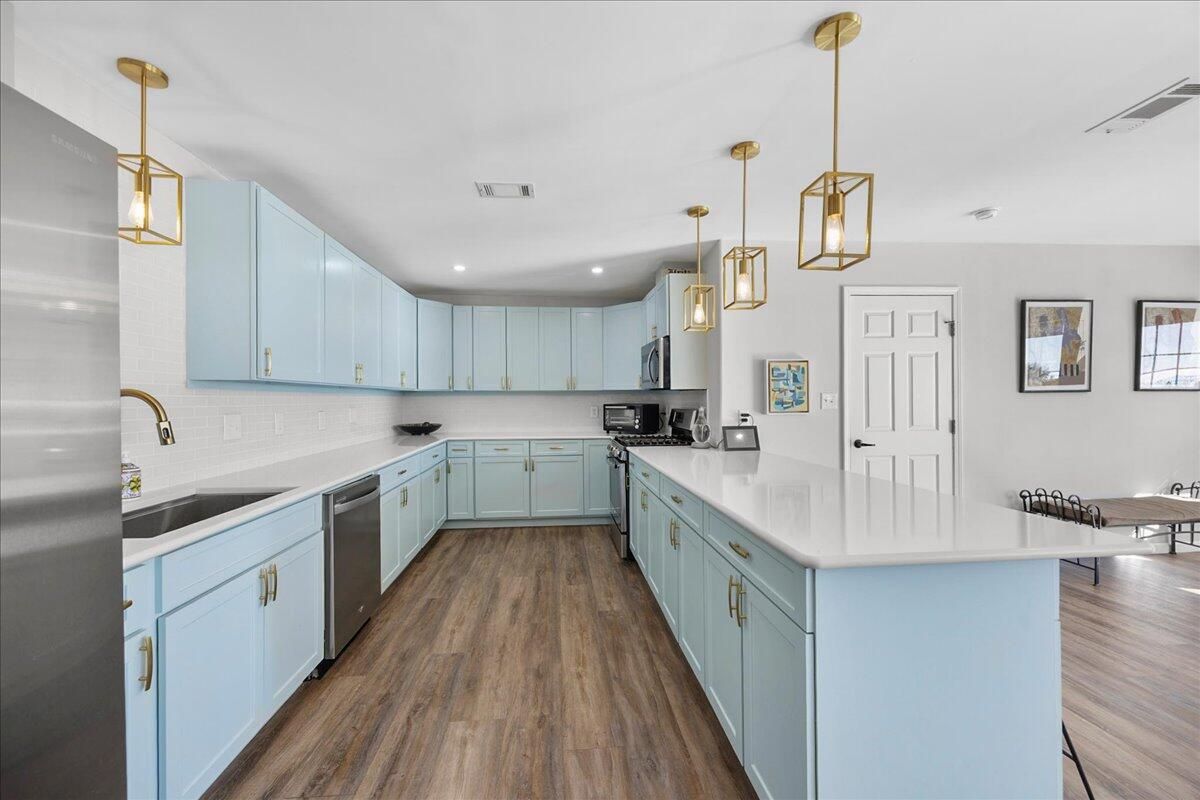 Interior, Kitchen, Pendant Lights, Recessed Lighting, Stainless Steel Appliances, Wood Texture Flooring