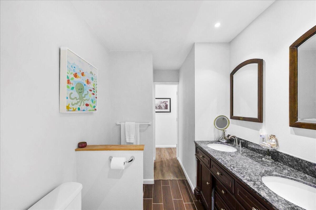 Bathroom, Dual Sink Vanities, Interior, Recessed Lighting, Wood Texture Flooring