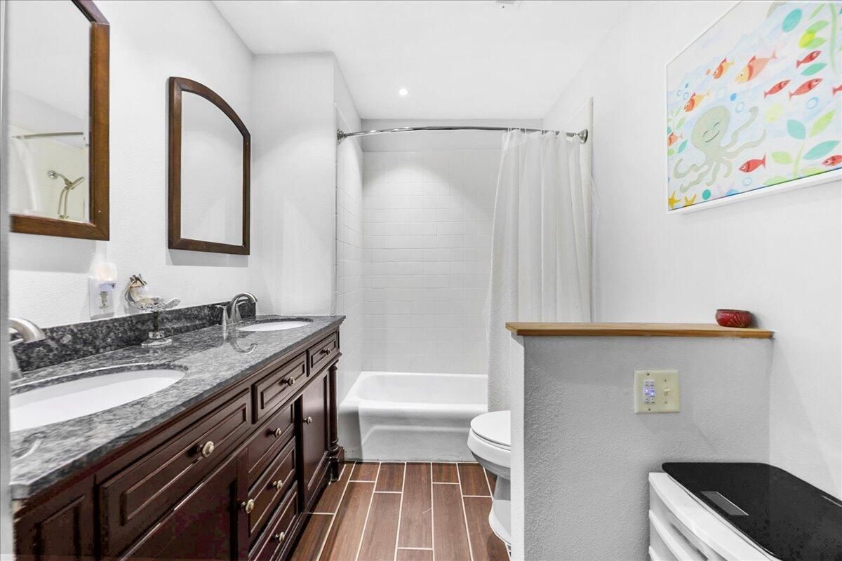 Bathroom, Dual Sink Vanities, Interior, Recessed Lighting, Wood Texture Flooring