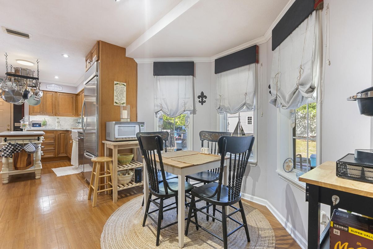 Dining room, Interior, Kitchen, Recessed Lighting, Stainless Steel Appliances, Wood Texture Flooring