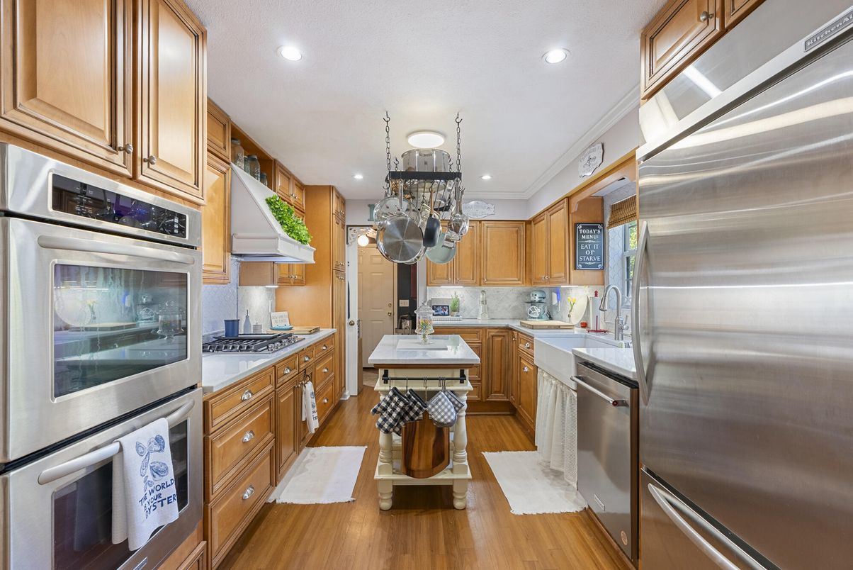 Chandelier, Interior, Kitchen, Recessed Lighting, Stainless Steel Appliances, Wood Texture Flooring