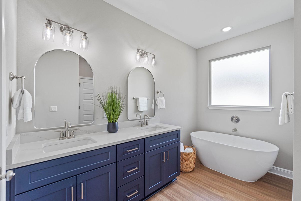 Bathroom, Dual Sink Vanities, Free Standing Baths, Interior, Recessed Lighting, Wood Texture Flooring