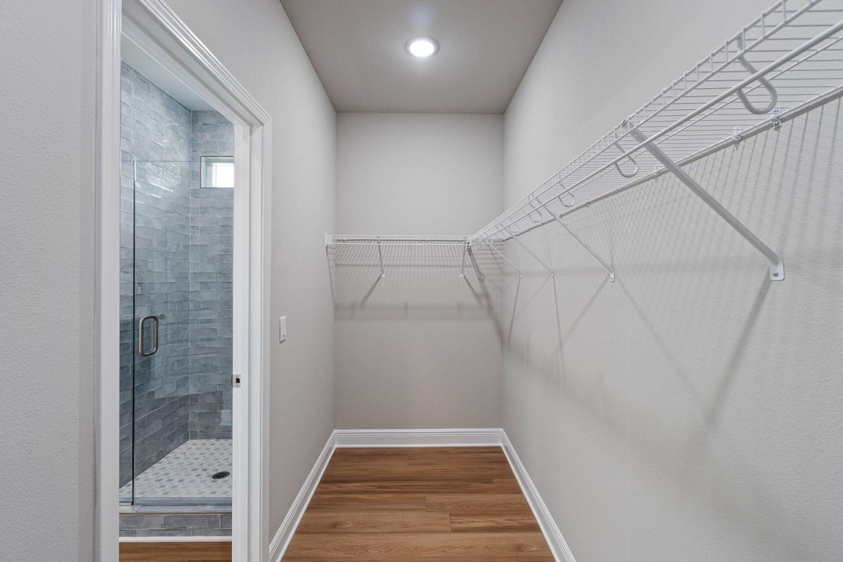 Bathroom, Glass Shower, Interior, Recessed Lighting, Walk-in Closets, Wood Texture Flooring
