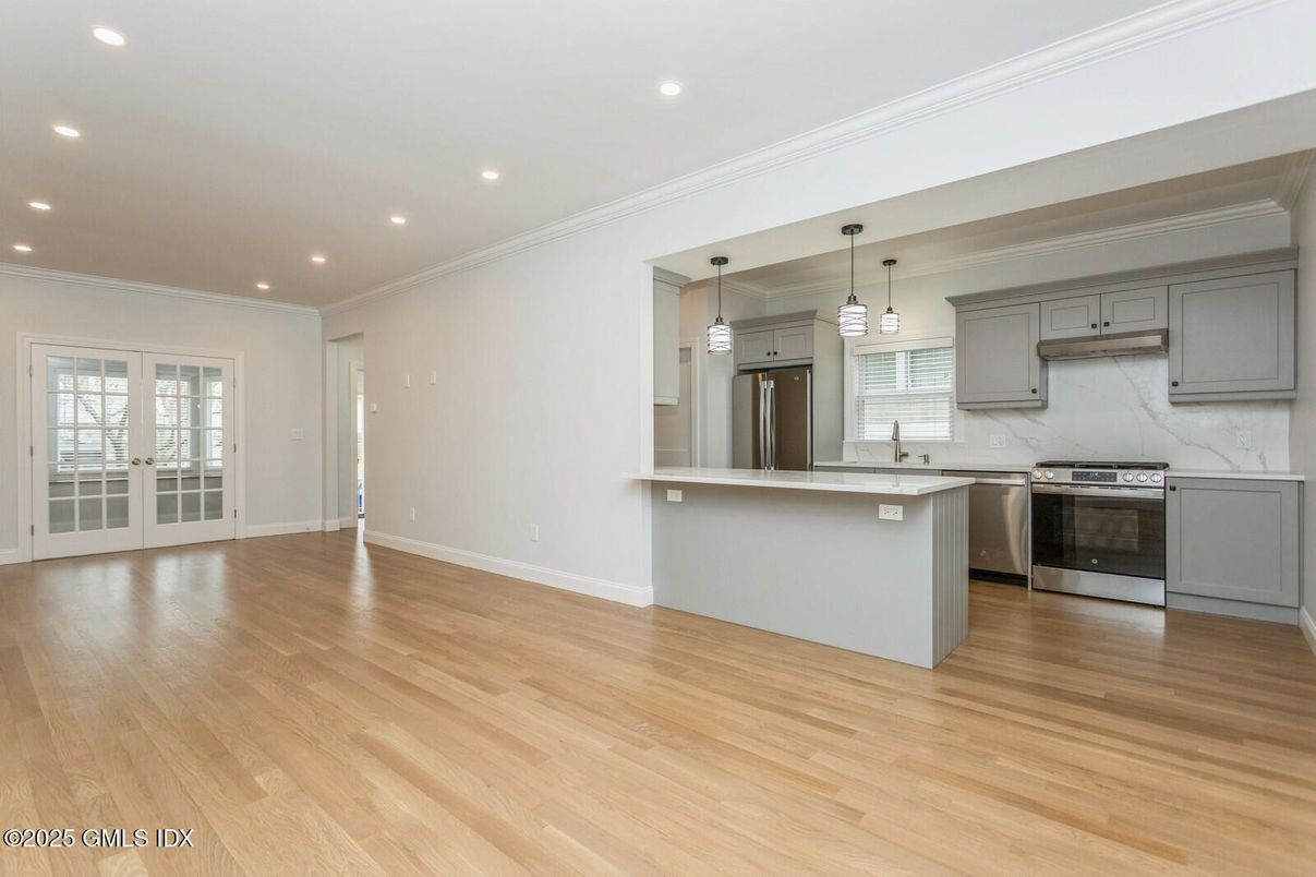 Interior, Kitchen, Pendant Lights, Recessed Lighting, Stainless Steel Appliances, Wood Texture Flooring