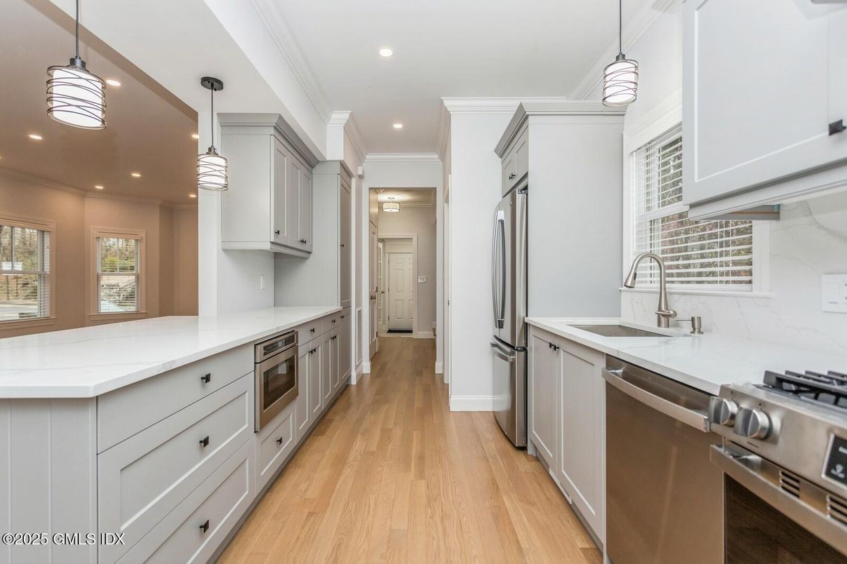 Interior, Kitchen, Pendant Lights, Recessed Lighting, Stainless Steel Appliances, Wood Texture Flooring