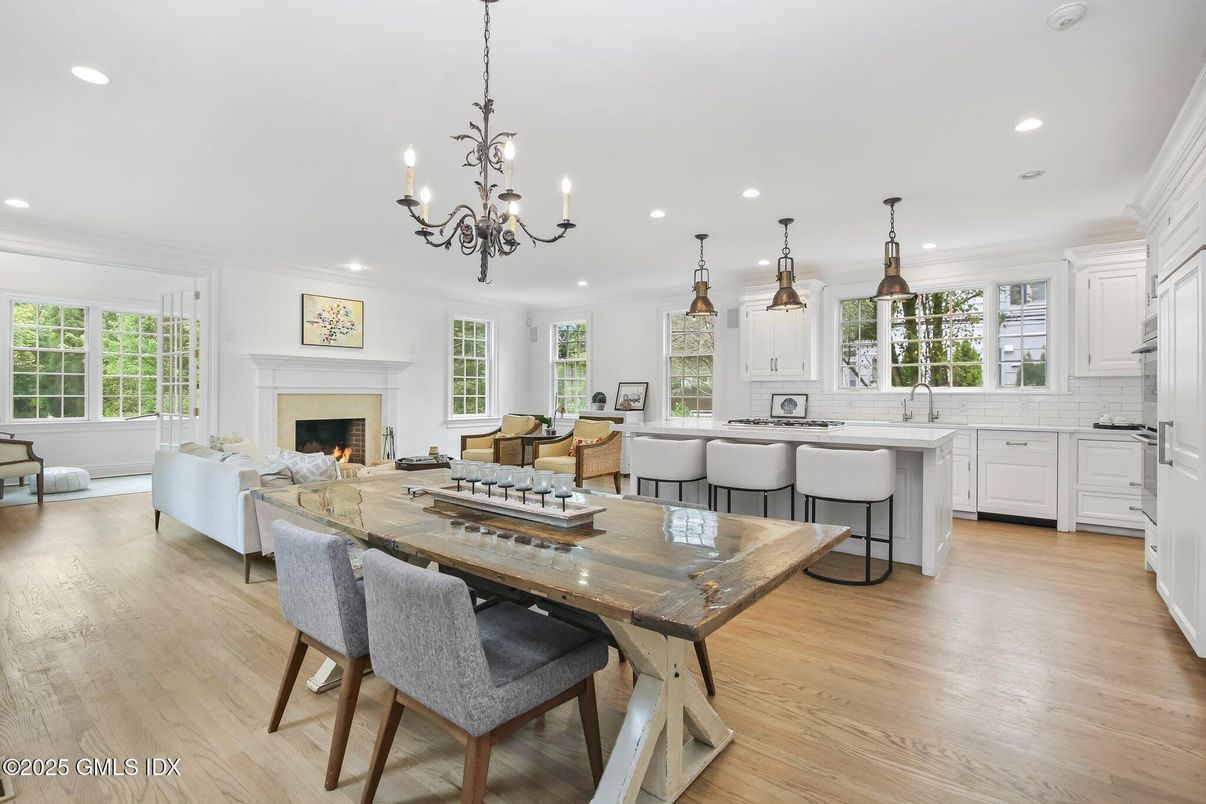 Chandelier, Dining room, Fireplace, Interior, Kitchen, Living room, Pendant Lights, Recessed Lighting, Wood Texture Flooring