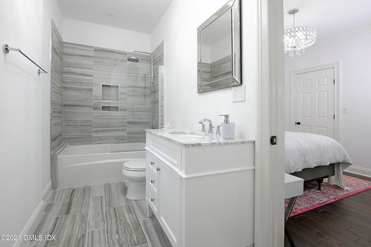 Bathroom, Bedroom, Chandelier, Glass Shower, Interior, Pendant Lights, Wood Texture Flooring