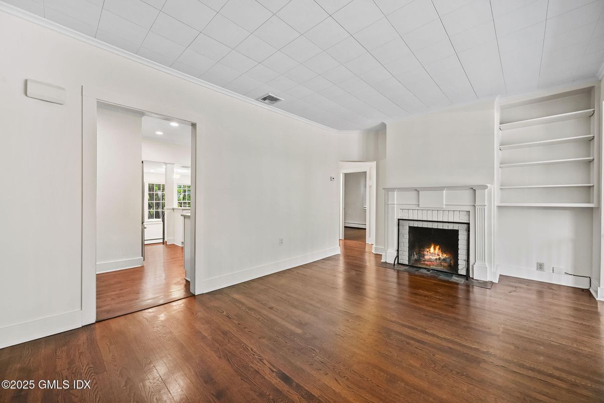 Empty room, Fireplace, Interior, Recessed Lighting, Wood Texture Flooring