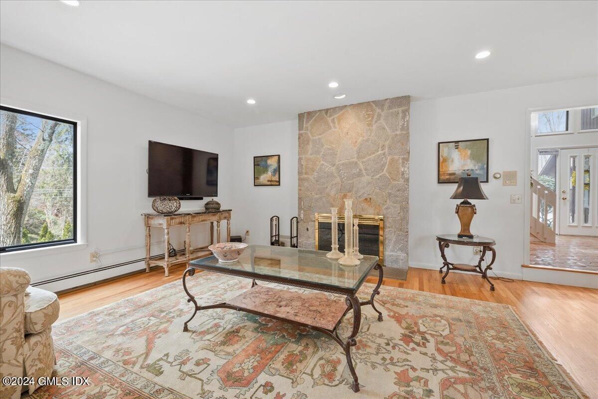Fireplace, Interior, Recessed Lighting, Stone Walls, Wood Texture Flooring
