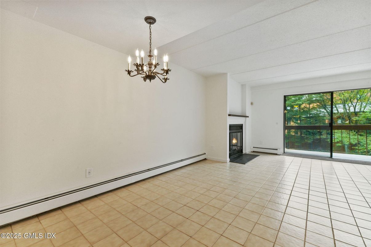 Chandelier, Empty room, Fireplace, Interior