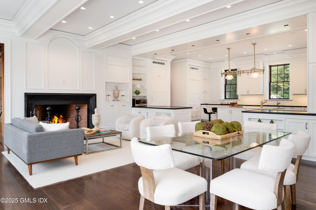 Dining room, Fireplace, Interior, Living room, Pendant Lights, Recessed Lighting, Wood Texture Flooring