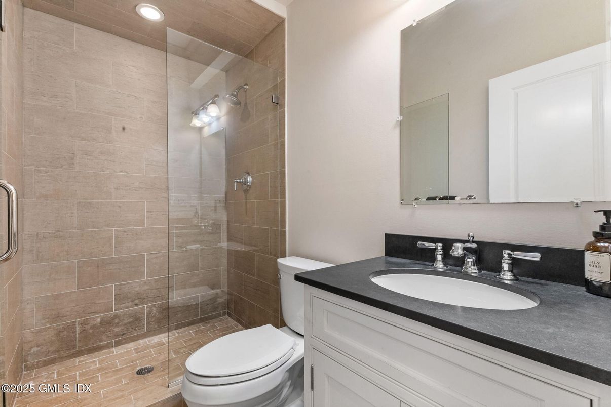 Bathroom, Glass Shower, Interior, Recessed Lighting, Stone Walls