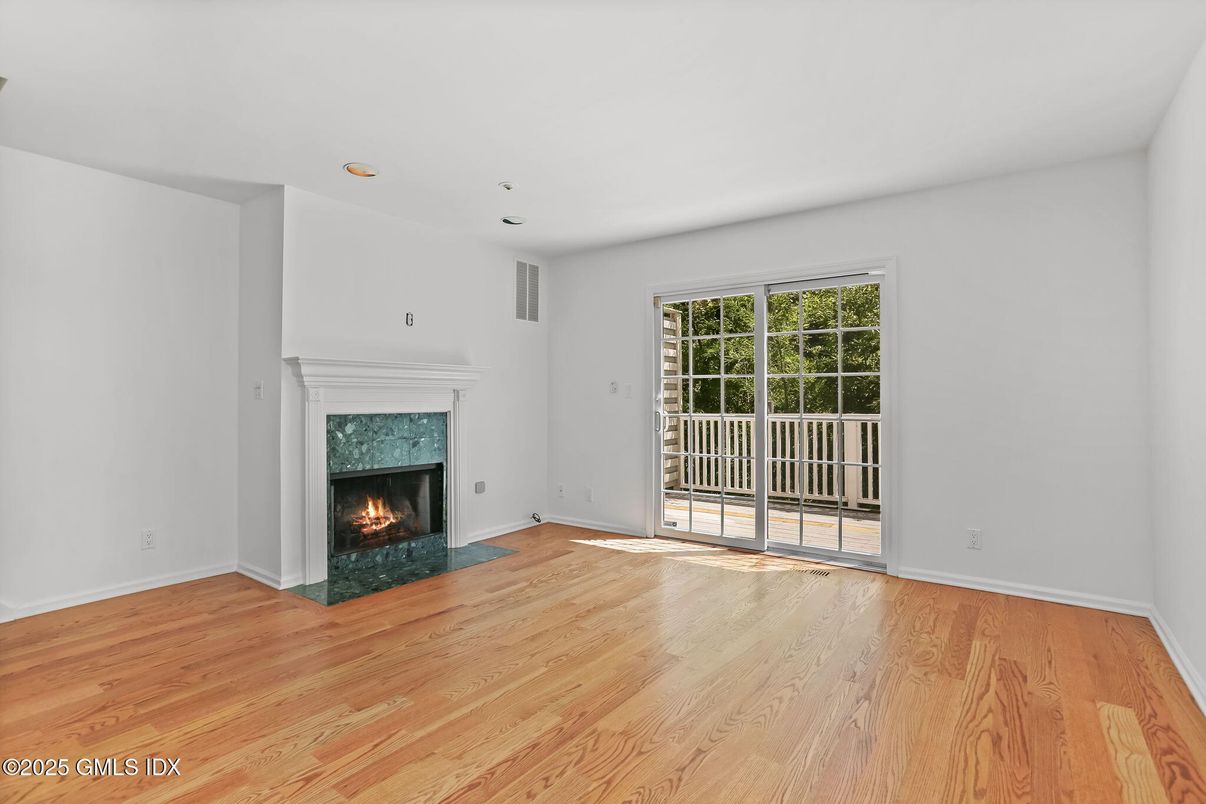 Empty room, Fireplace, Interior, Recessed Lighting, Wood Texture Flooring