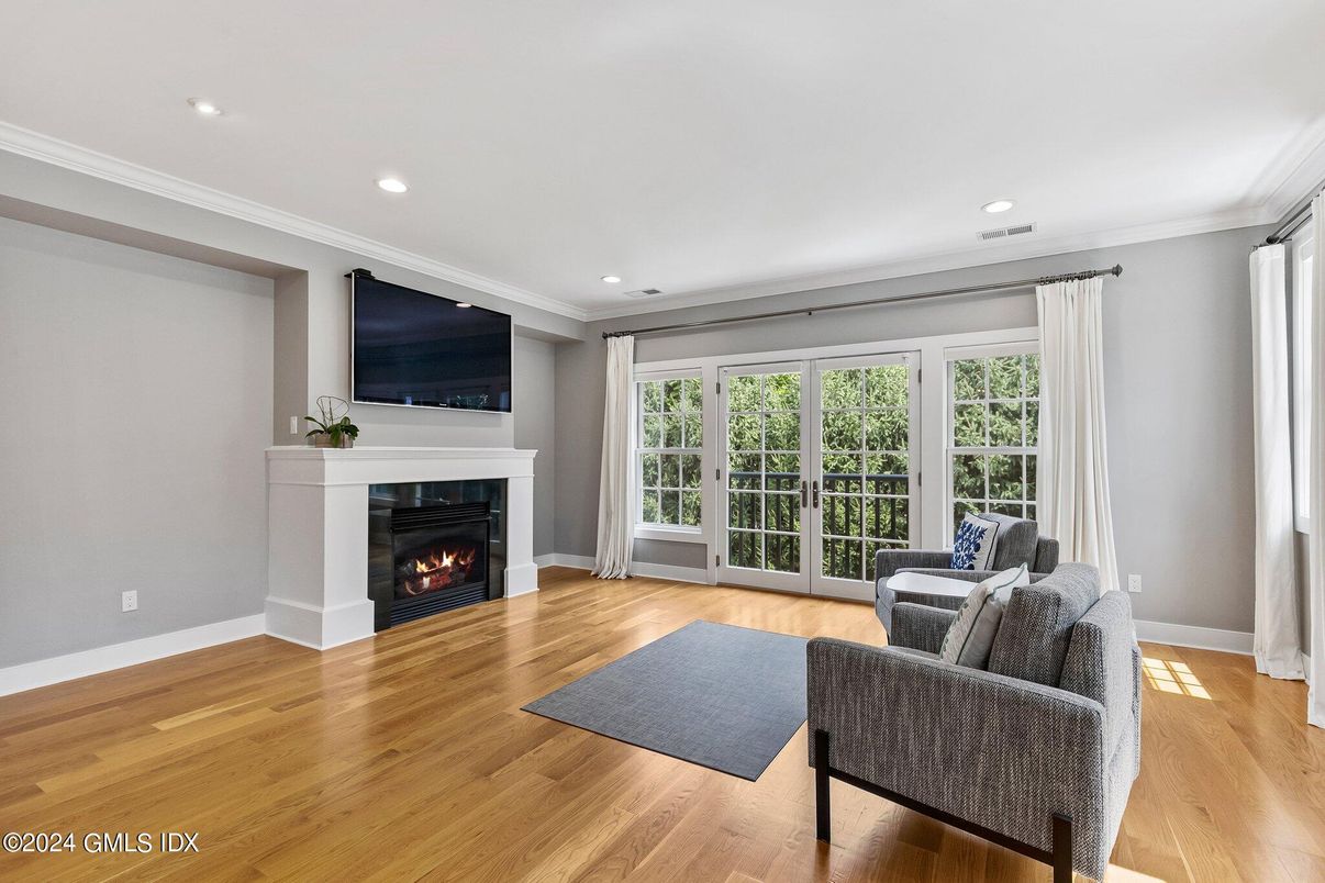 Fireplace, Interior, Living room, Recessed Lighting, Wood Texture Flooring
