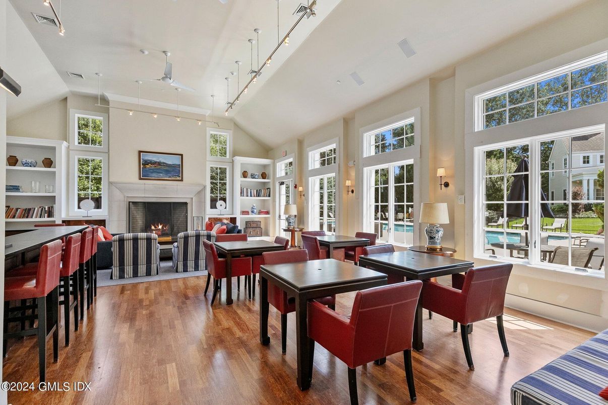 Dining room, Fireplace, Interior, Living room, Recessed Lighting, Wood Texture Flooring