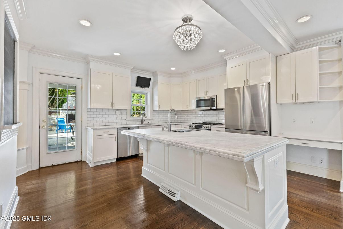 Chandelier, Interior, Kitchen, Recessed Lighting, Stainless Steel Appliances, Wood Texture Flooring