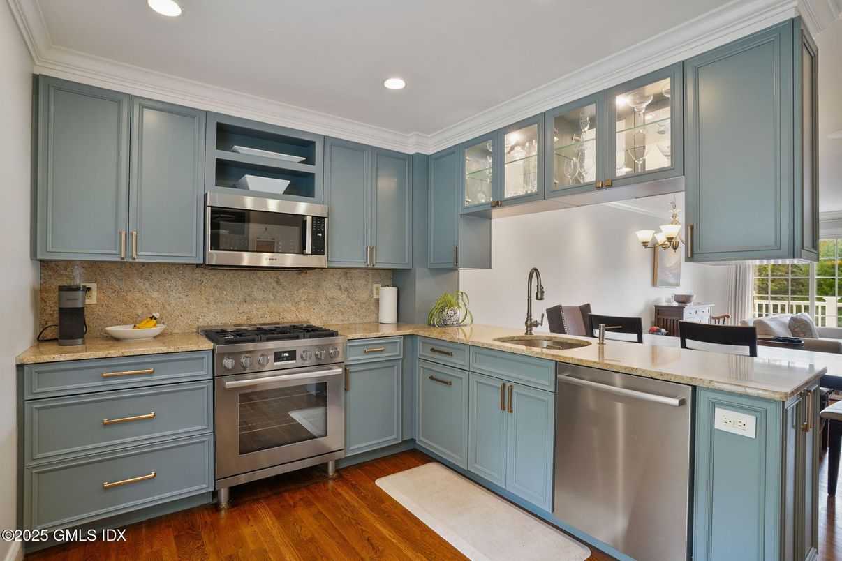 Dining room, Interior, Kitchen, Recessed Lighting, Stainless Steel Appliances, Wood Texture Flooring