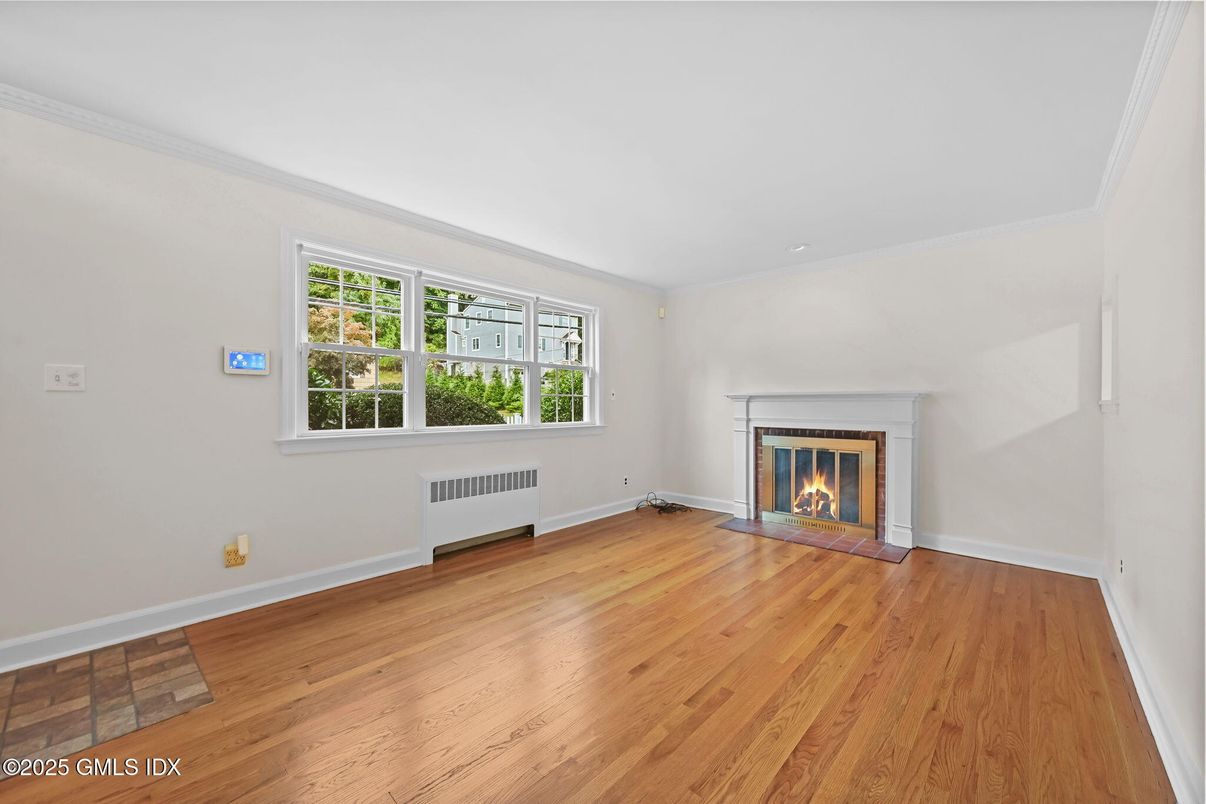 Empty room, Fireplace, Interior, Recessed Lighting, Wood Texture Flooring
