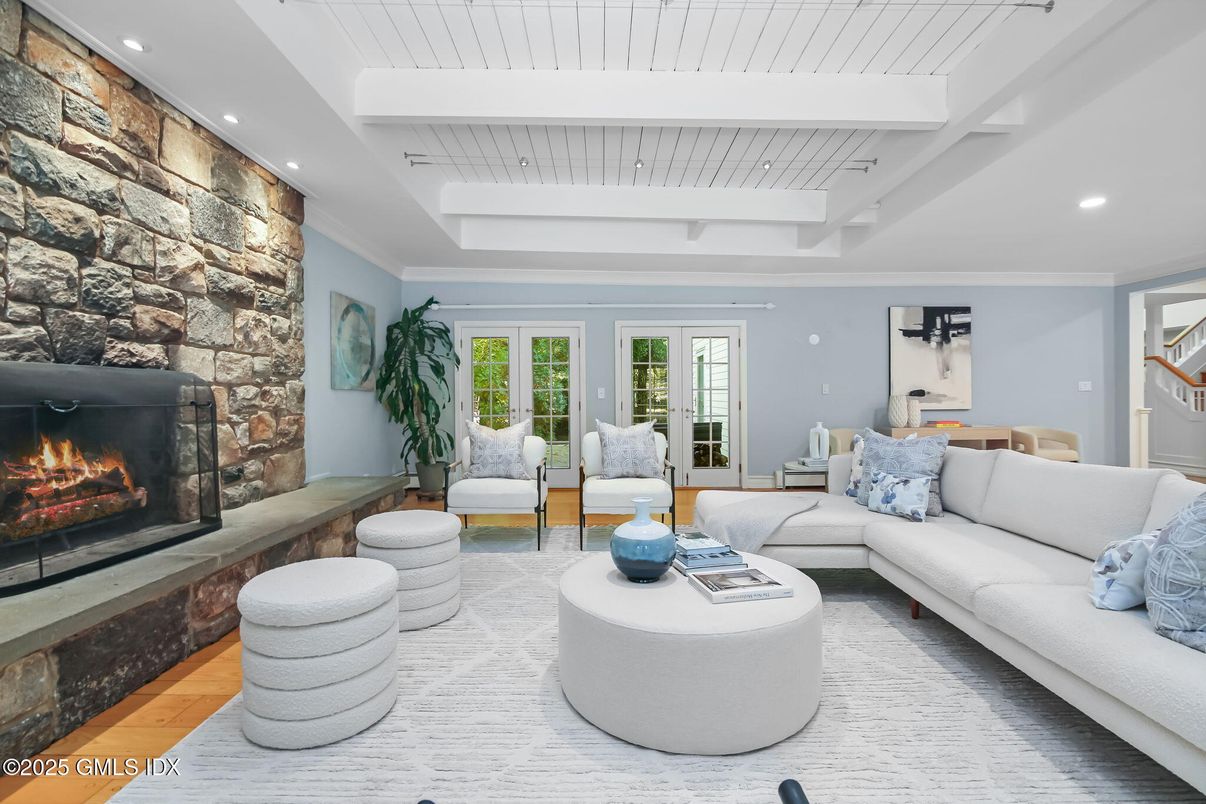 Fireplace, Interior, Living room, Recessed Lighting, Stone Walls, Wood Texture Flooring