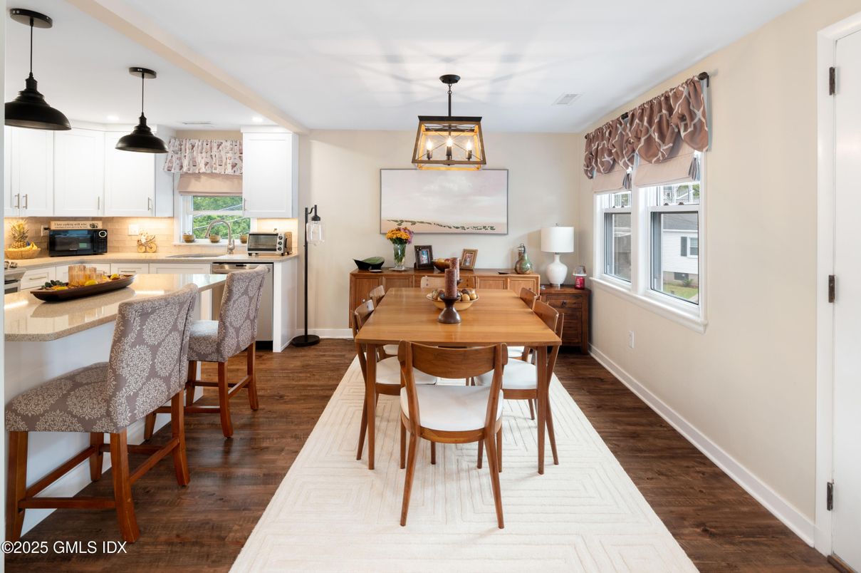 Dining room, Interior, Kitchen, Pendant Lights, Recessed Lighting, Stainless Steel Appliances, Wood Texture Flooring