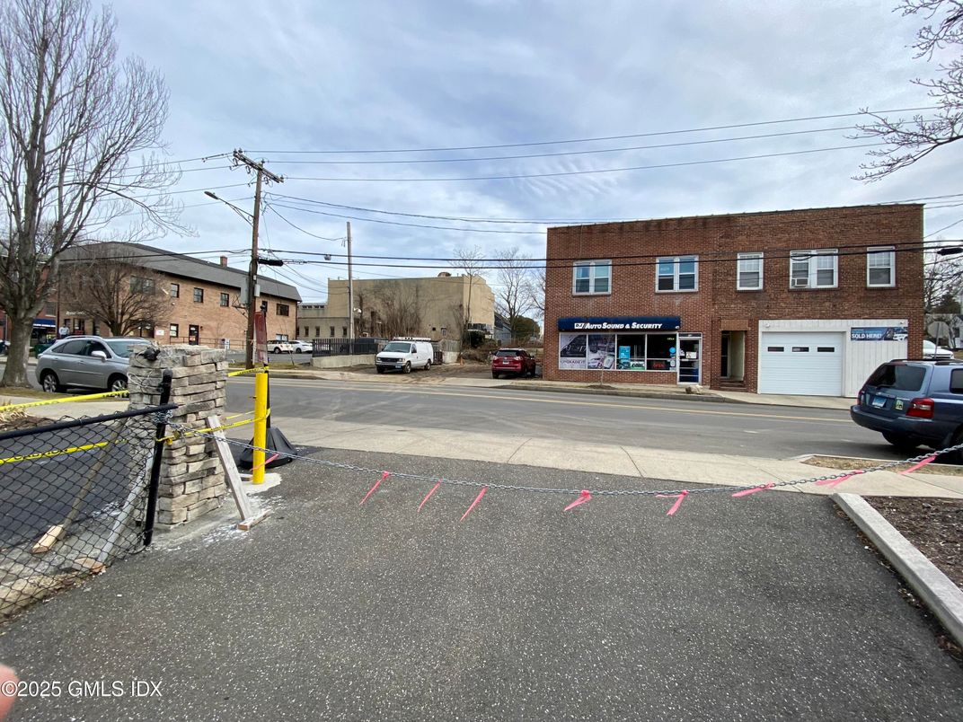 Attached, Exterior, Facade, Brick Facade, Condo Building