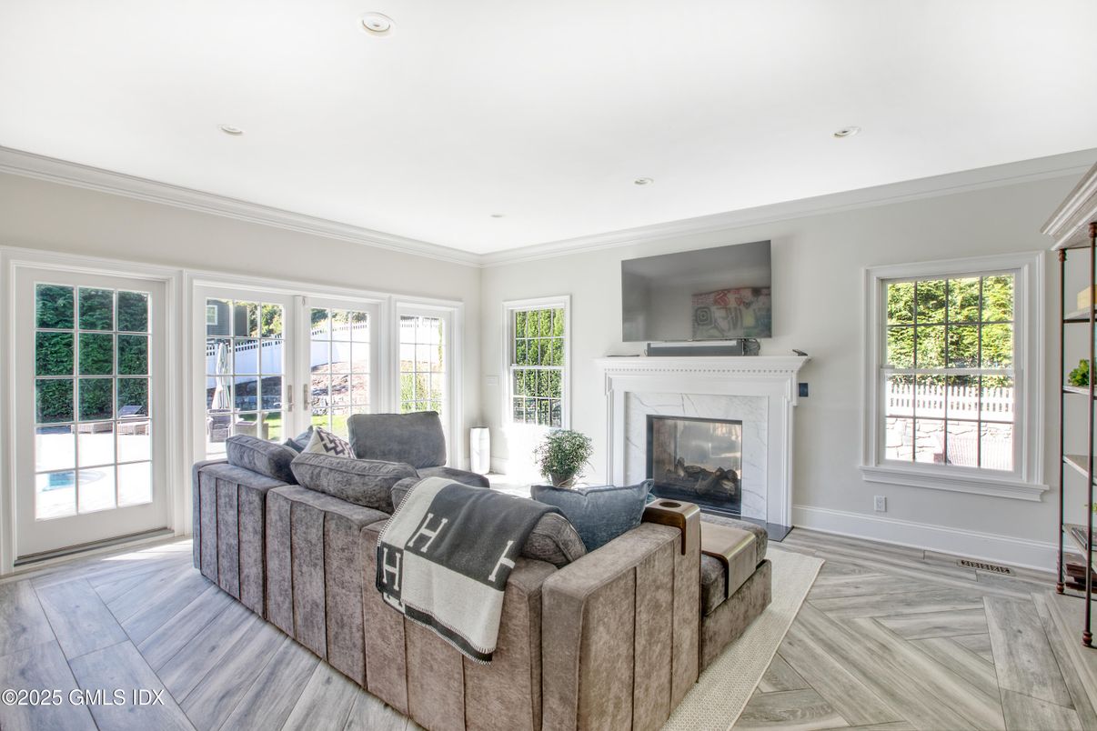 Fireplace, Interior, Living room, Recessed Lighting, Wood Texture Flooring
