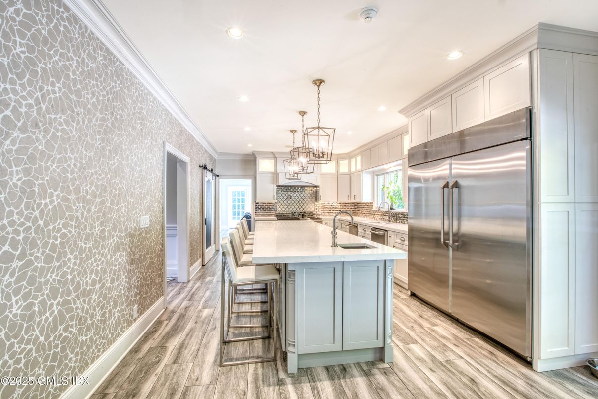 Interior, Kitchen, Pendant Lights, Recessed Lighting, Stainless Steel Appliances, Wood Texture Flooring