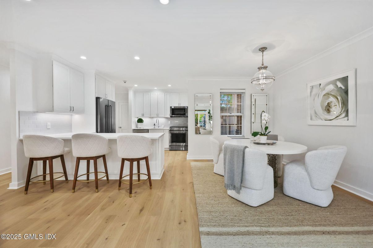 Dining room, Interior, Kitchen, Pendant Lights, Recessed Lighting, Stainless Steel Appliances, Wood Texture Flooring