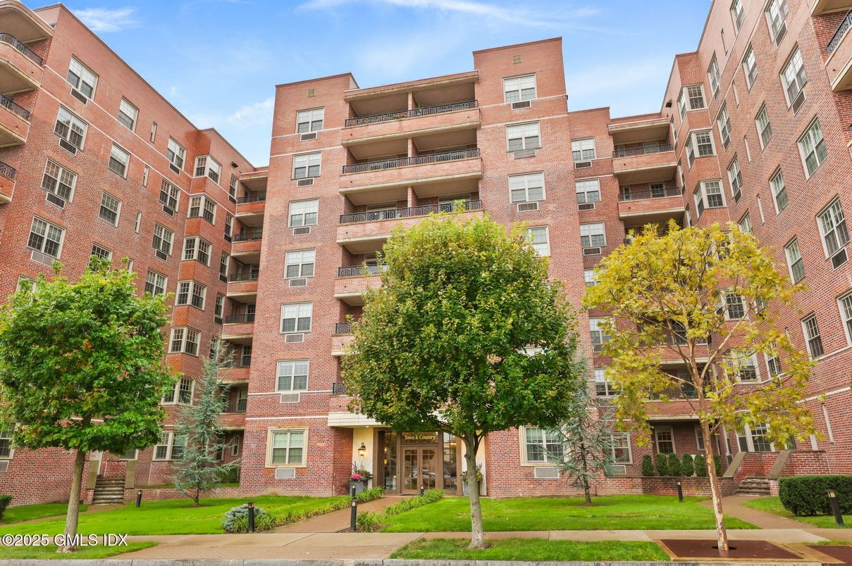 Exterior, Facade, Brick Facade, Condo Building