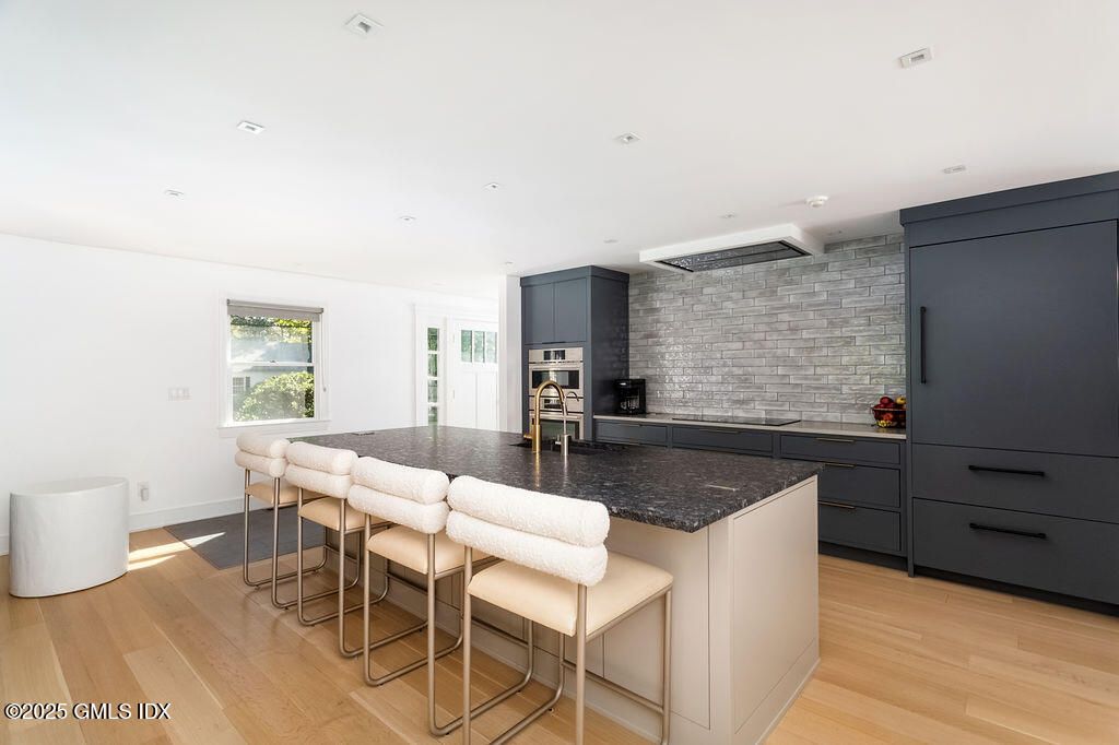 Interior, Kitchen, Recessed Lighting, Stainless Steel Appliances, Stone Walls, Wood Texture Flooring