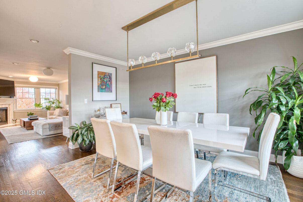 Dining room, Fireplace, Interior, Living room, Pendant Lights, Recessed Lighting, Wood Texture Flooring