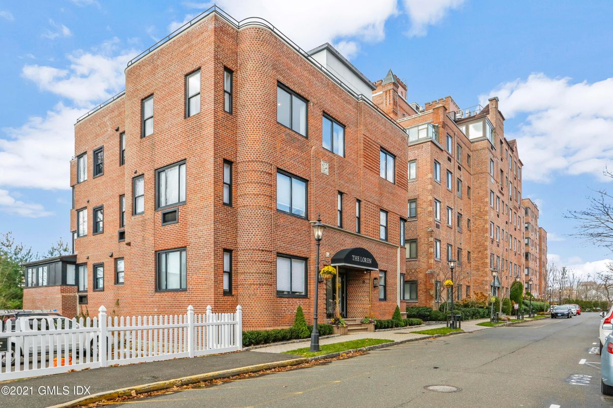 Exterior, Facade, Brick Facade, Condo Building