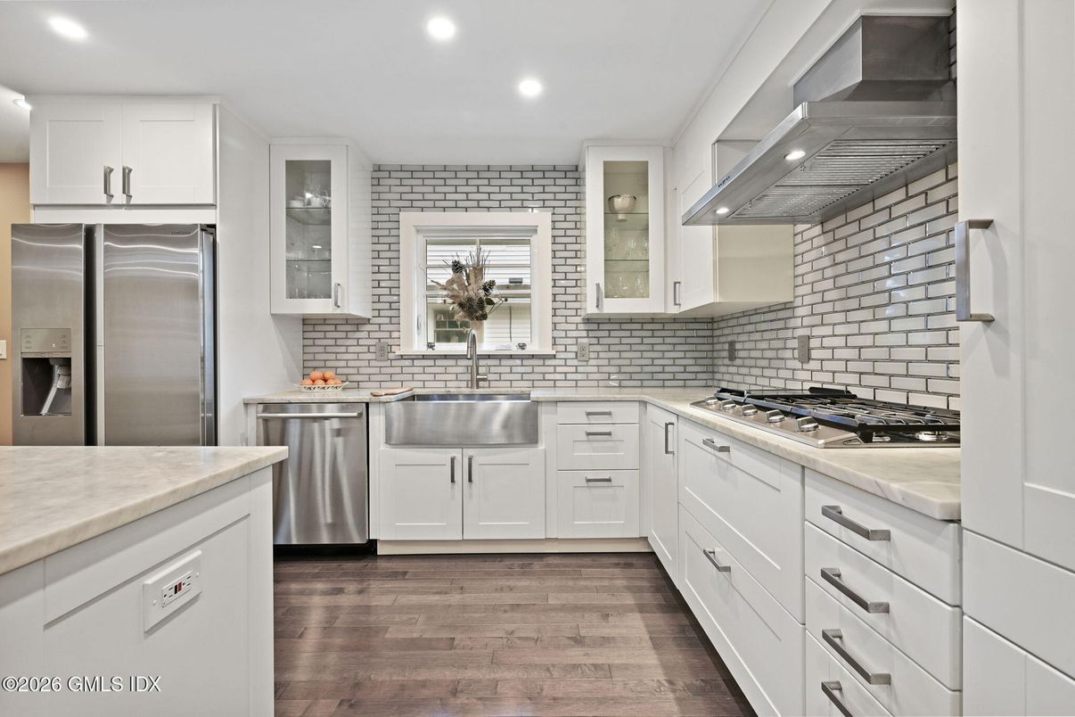 Interior, Kitchen, Recessed Lighting, Stainless Steel Appliances, Stone Walls, Wood Texture Flooring