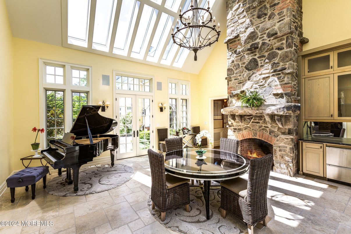 Fireplace, Interior, Pendant Lights, Piano, Stone Walls