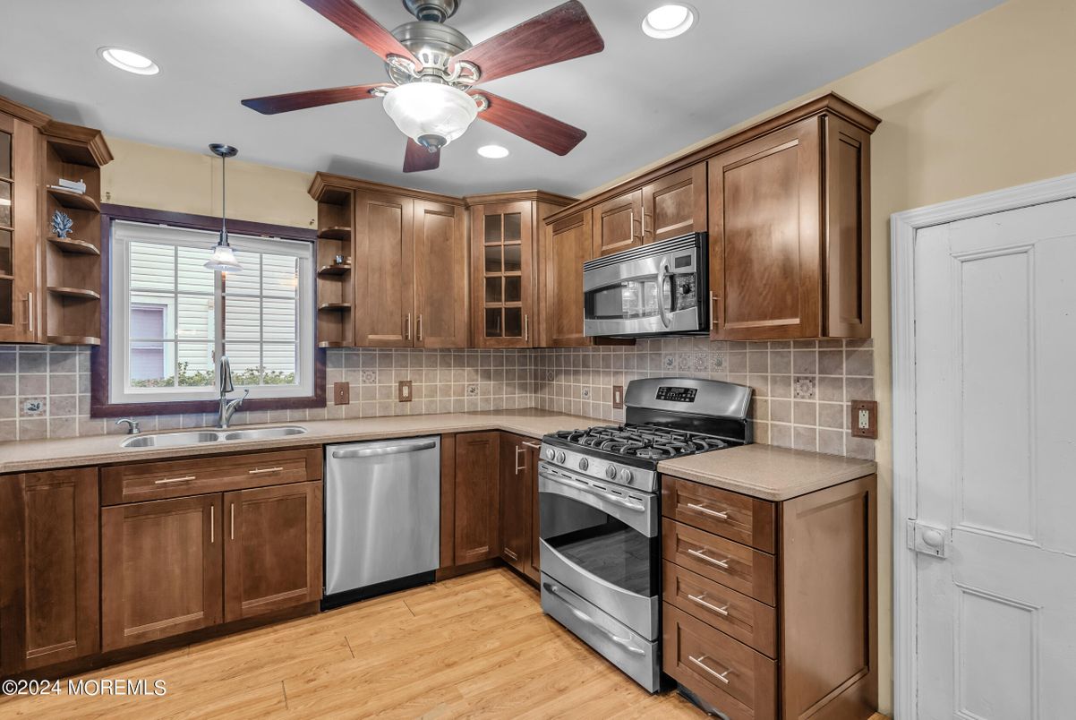 Interior, Kitchen, Pendant Lights, Recessed Lighting, Stainless Steel Appliances, Wood Texture Flooring