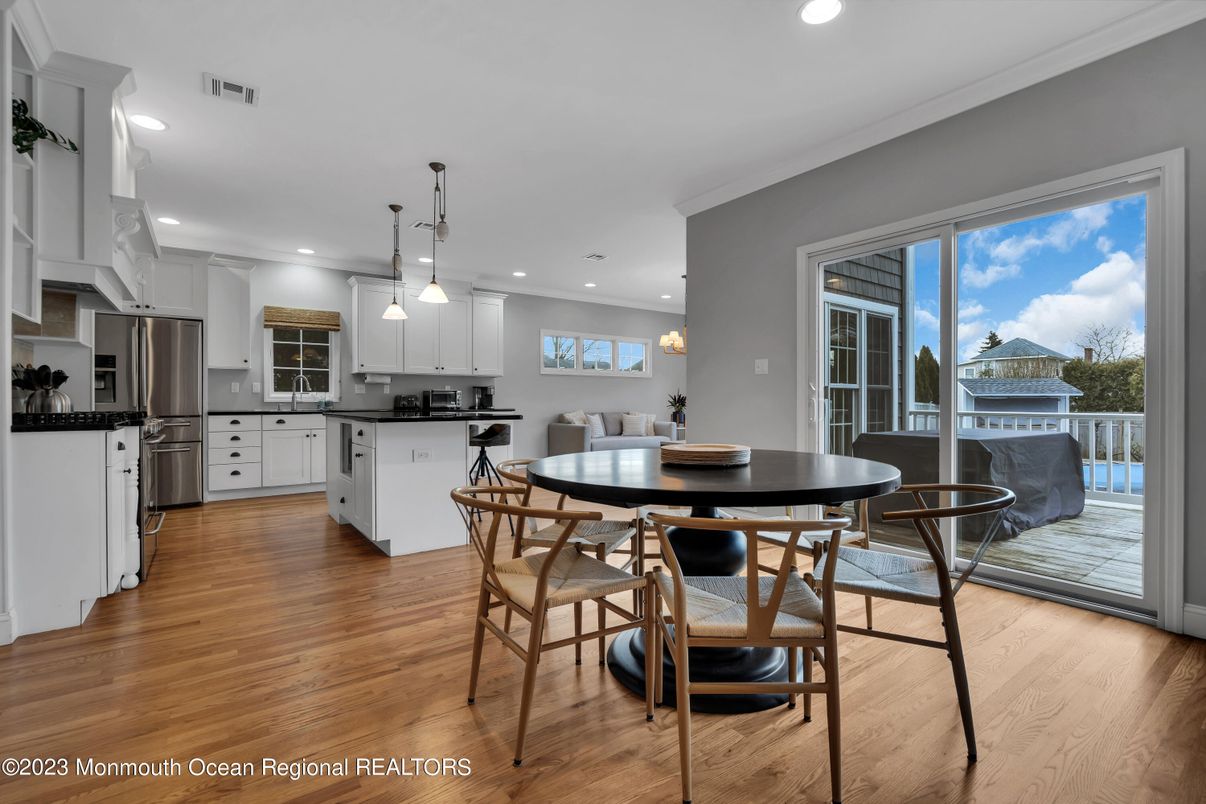 Dining room, Interior, Kitchen, Pendant Lights, Recessed Lighting, Stainless Steel Appliances, Wood Texture Flooring