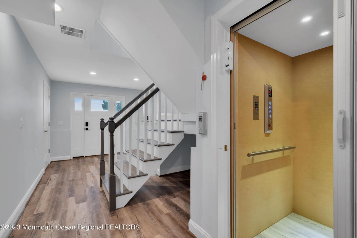 Elevator, Interior, Recessed Lighting, Wood Texture Flooring