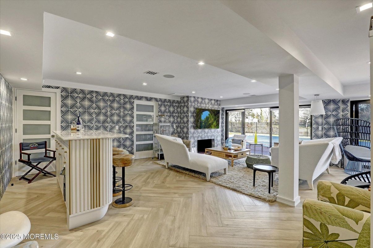 Fireplace, Interior, Living room, Recessed Lighting, Stone Walls, Wood Texture Flooring