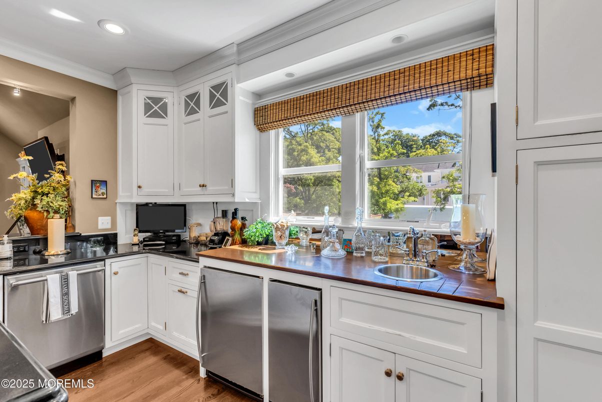 Interior, Kitchen, Recessed Lighting, Stainless Steel Appliances, Tile Countertops, Wood Texture Flooring