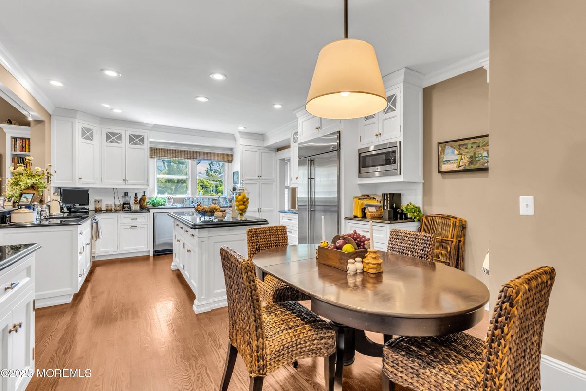 Dining room, Interior, Kitchen, Pendant Lights, Recessed Lighting, Stainless Steel Appliances, Wood Texture Flooring
