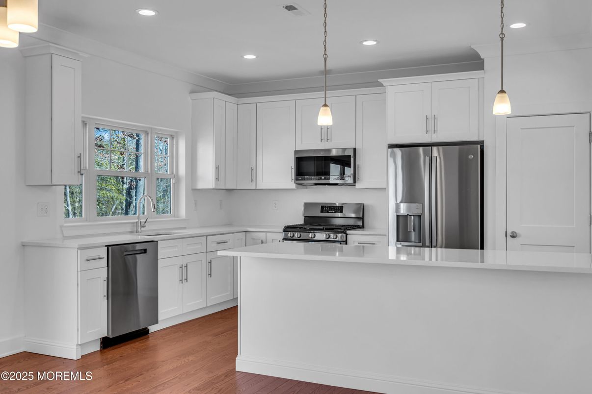 Interior, Kitchen, Pendant Lights, Recessed Lighting, Stainless Steel Appliances, Wood Texture Flooring