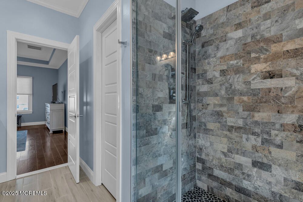 Bathroom, Glass Shower, Interior, Stone Walls, Wood Texture Flooring