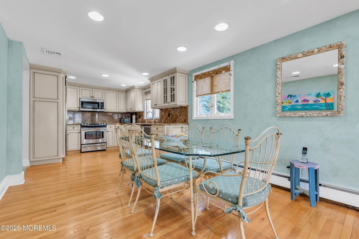 Dining room, Interior, Kitchen, Recessed Lighting, Stainless Steel Appliances, Wood Texture Flooring