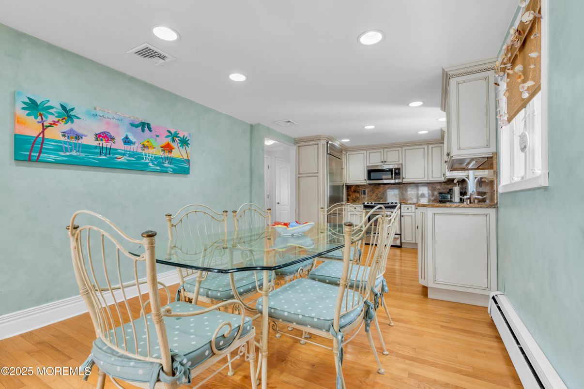 Dining room, Interior, Kitchen, Recessed Lighting, Stainless Steel Appliances, Wood Texture Flooring